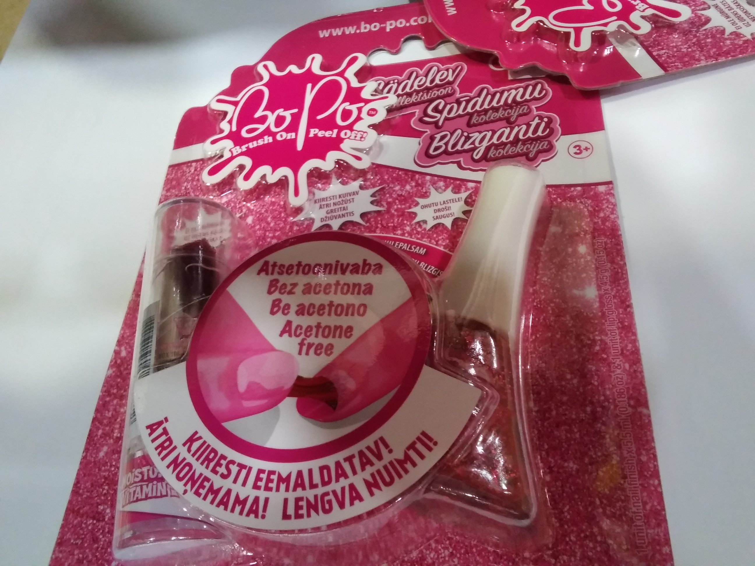 Izpārdošana! Bopo Noņemama nagu laka uz ūdens bāzes ar SARKANIEM spīdumiņiem 1gb. + krāsu mainošs SARKANS lūpu balzāms